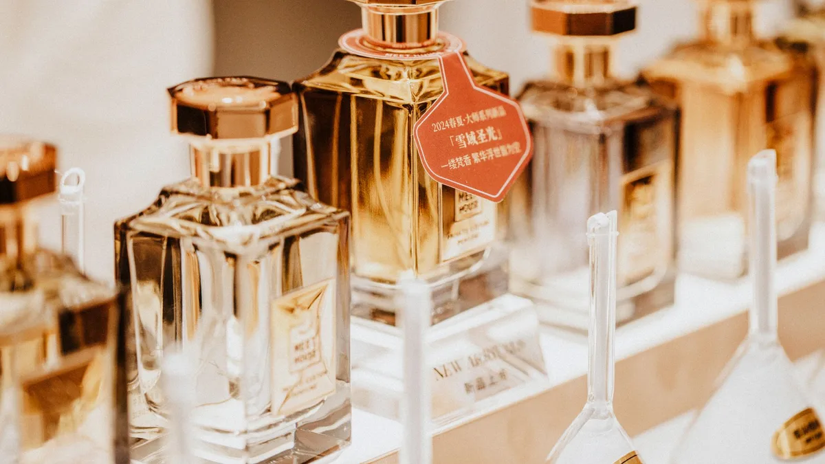 Elegant collection of perfume bottles showcasing luxury fragrances in a stylish retail display.
